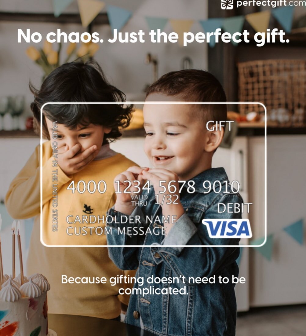 Two Fandango gift cards are held in hand against a blurred retail display. One has a $25 value, the other $50. Both feature Fandango's logo.