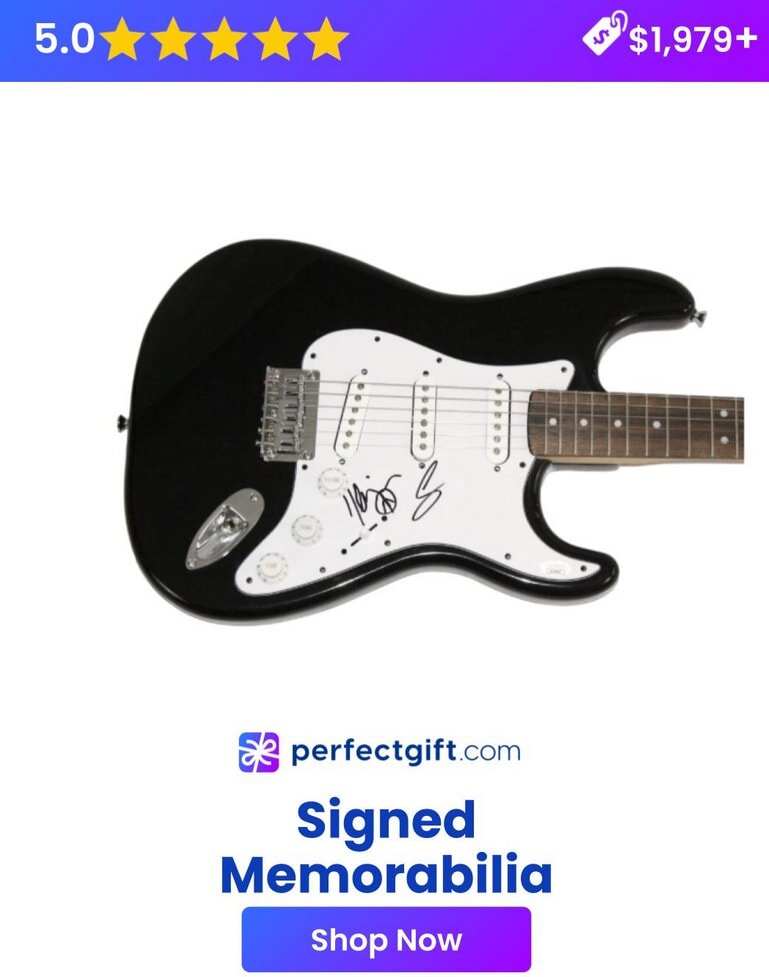 Black electric guitar with signatures, rated 5 stars, priced at $1,979+. PerfectGift.com offers signed memorabilia. Shop now.