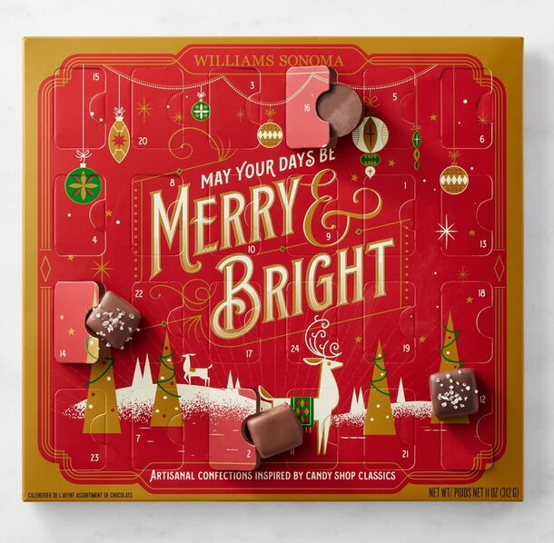 Advent calendar with festive design featuring the phrase "May you be merry and bright" in colorful lettering.  