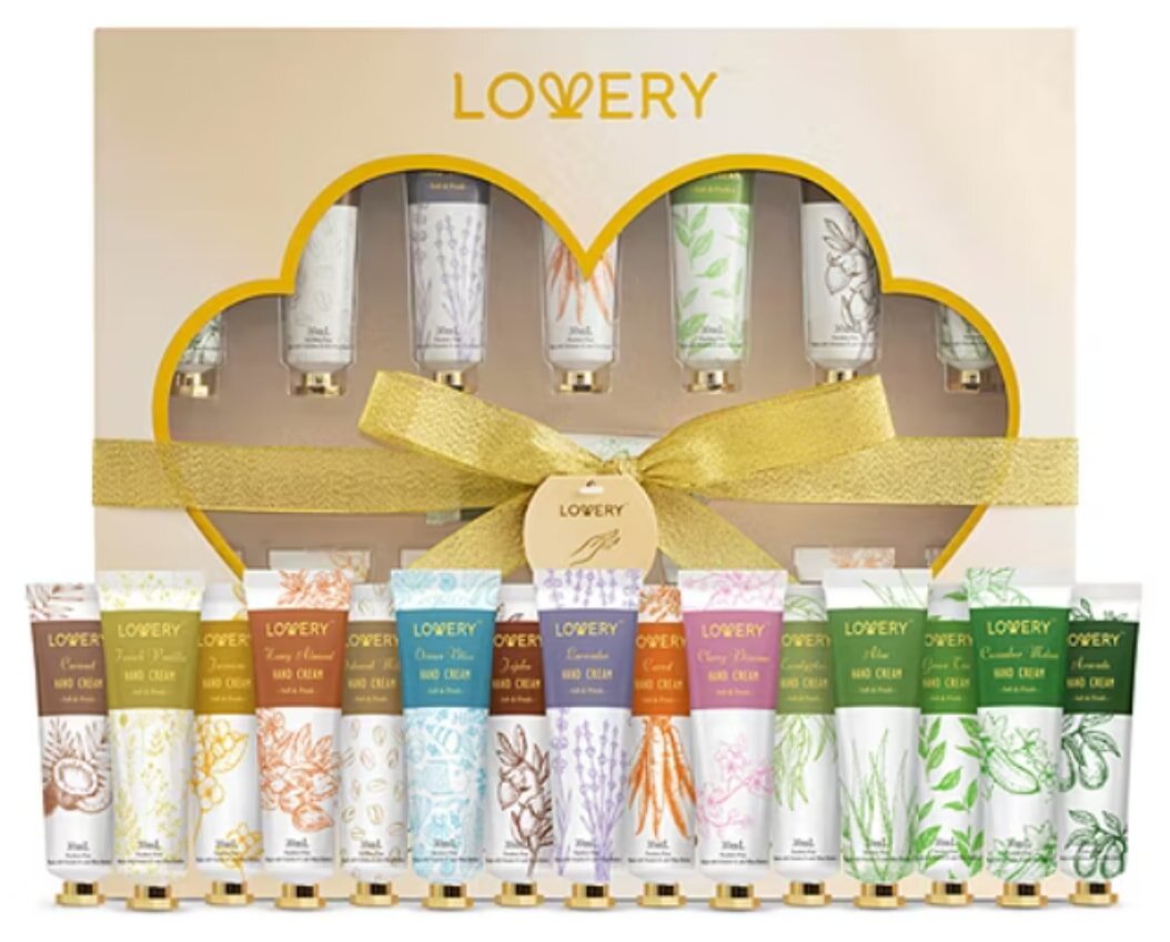 A beautifully packaged hand cream gift set featuring various scented creams in elegant containers.
