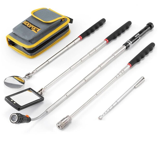 A collection of tools featuring a hammer, a flathead screwdriver, and a Phillips screwdriver on a wooden surface.