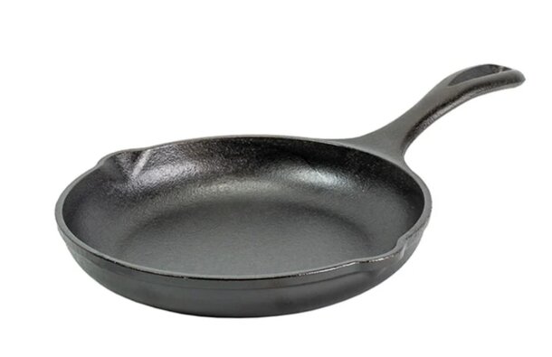 A black frying pan placed on a clean white background, showcasing its smooth surface and round shape.