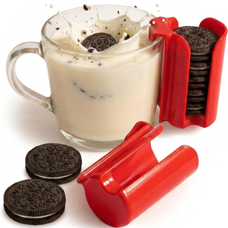 Glass mug with milk and Oreo cookies, red cookie holder