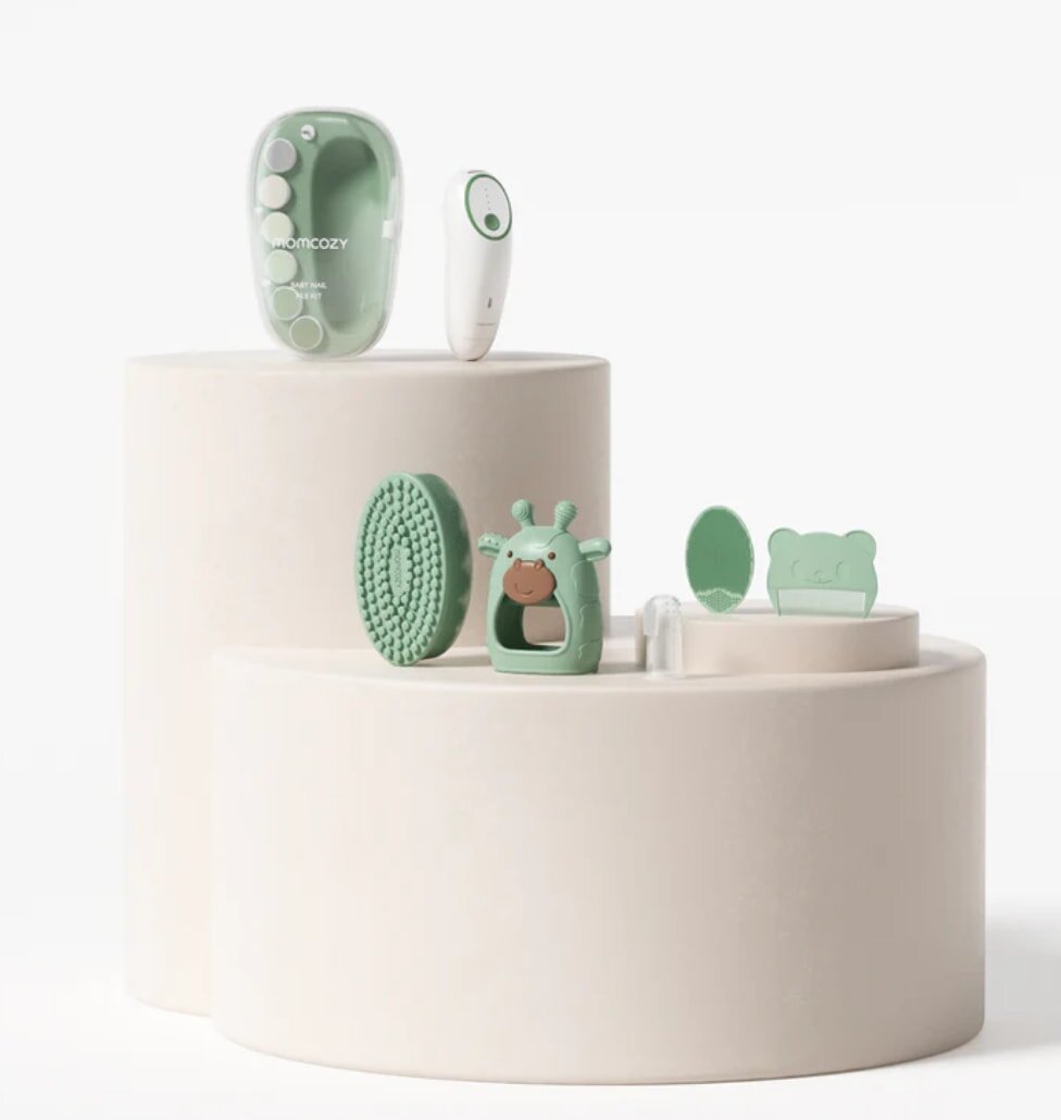 A white pedestal displays a green toothbrush alongside a tube of toothpaste.