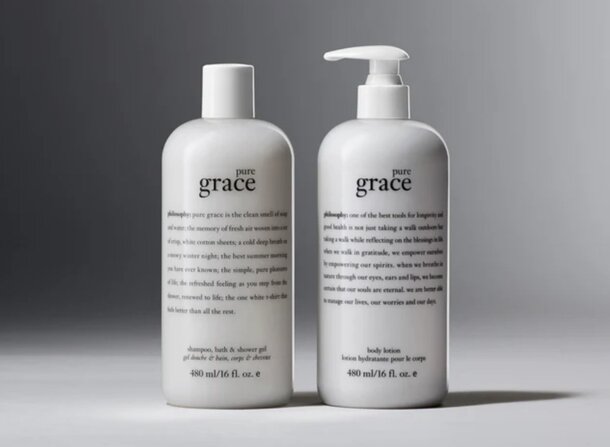 Philosophy Grace shampoo and conditioner bottles on a white background, showcasing their elegant design and branding.