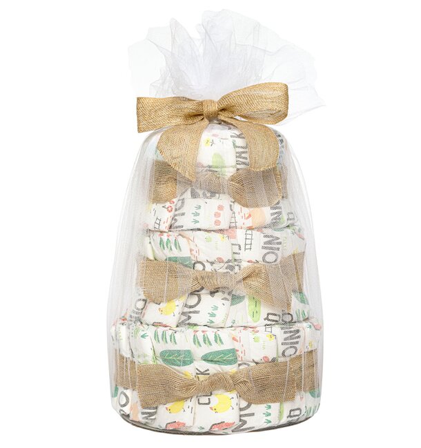 A stack of baby diapers neatly wrapped in clear plastic, showcasing their soft, white material and compact packaging.