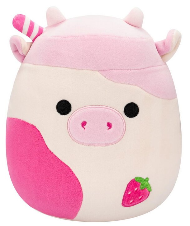 A pink cow stuffed animal adorned with a strawberry on its head, showcasing a playful and whimsical design.