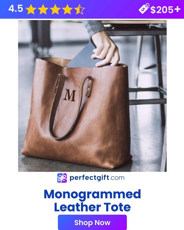 Monogrammed leather tote bag featuring a sleek design and personalized initials embossed on the front.