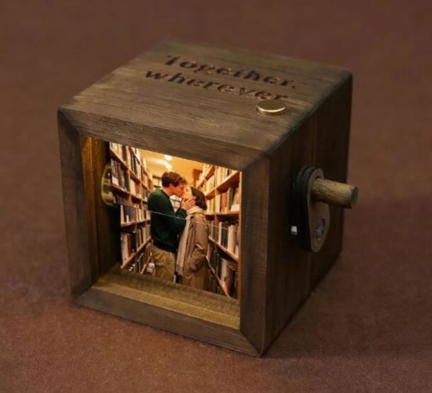 A wooden music box with intricate carvings, playing a soft melody, evoking a sense of nostalgia and warmth.