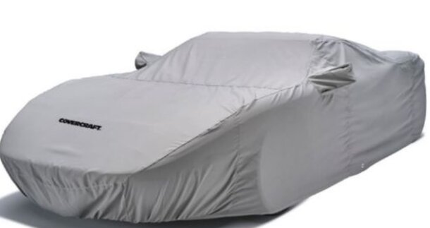 A car cover displayed on a white background, designed to protect a vehicle from dust and weather elements.