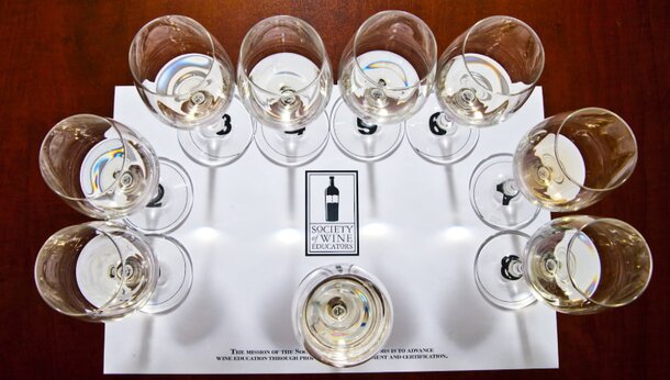 A table displaying a white mat placed neatly on its surface.