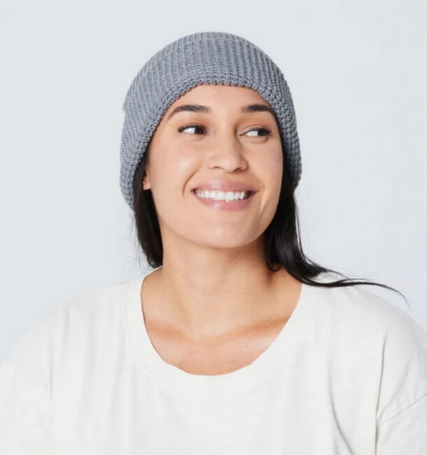 A soft, lightweight wool beanie, perfect for warmth and comfort in cooler weather.
