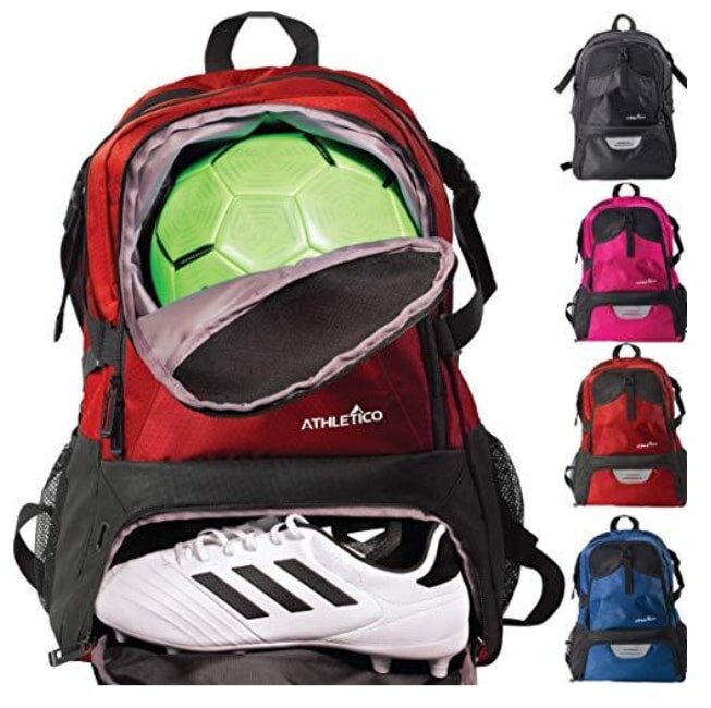 A soccer ball and various sports gear are packed inside a backpack, ready for an athletic outing.