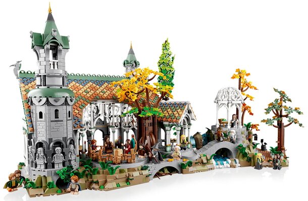 A colorful Lego castle surrounded by trees and a flowing waterfall, creating a whimsical landscape.  