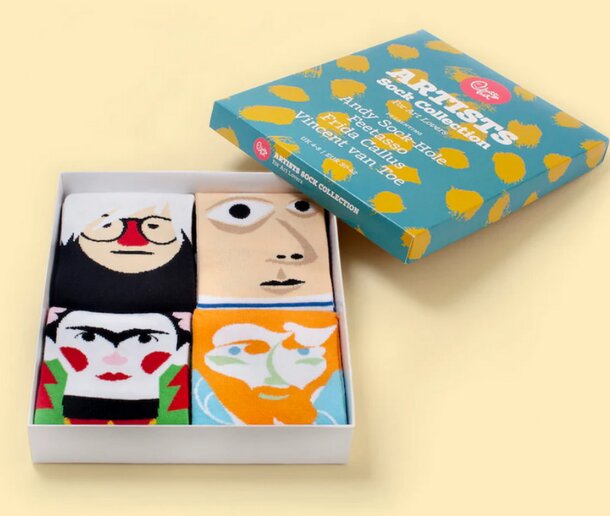 A box of socks featuring a man's face prominently displayed on the packaging.