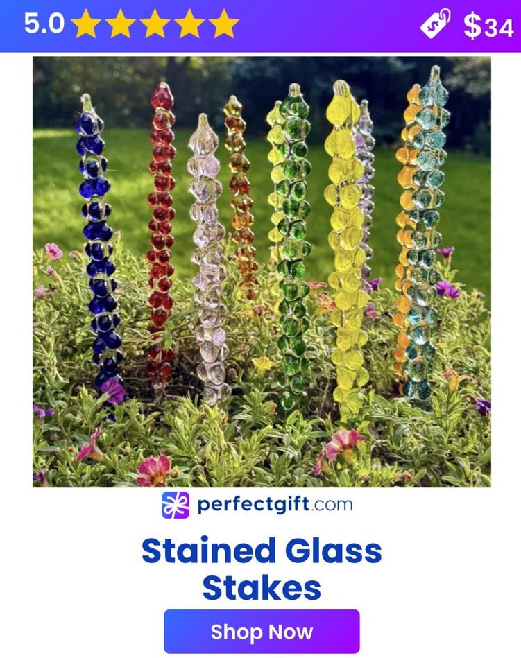 Colorful stained glass stakes in a garden setting, rated 5 stars, priced at $34. PerfectGift.com offers "Shop Now" option.
