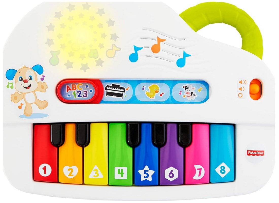 Colorful Fisher Price music piano with keys, buttons, and musical notes, designed for young children to explore sounds.