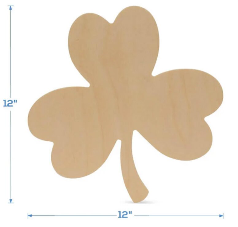 A wooden shamrock crafted in the shape of a leaf, showcasing natural grain and a rich brown finish.