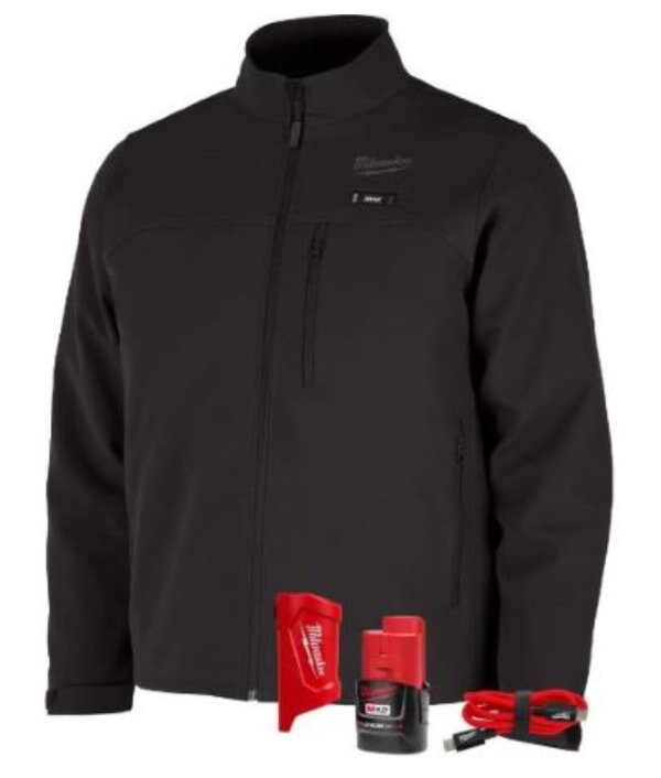 M18 soft shell jacket by Milwaukee Tools with a battery charger placed next to it, showcasing workwear and accessories.