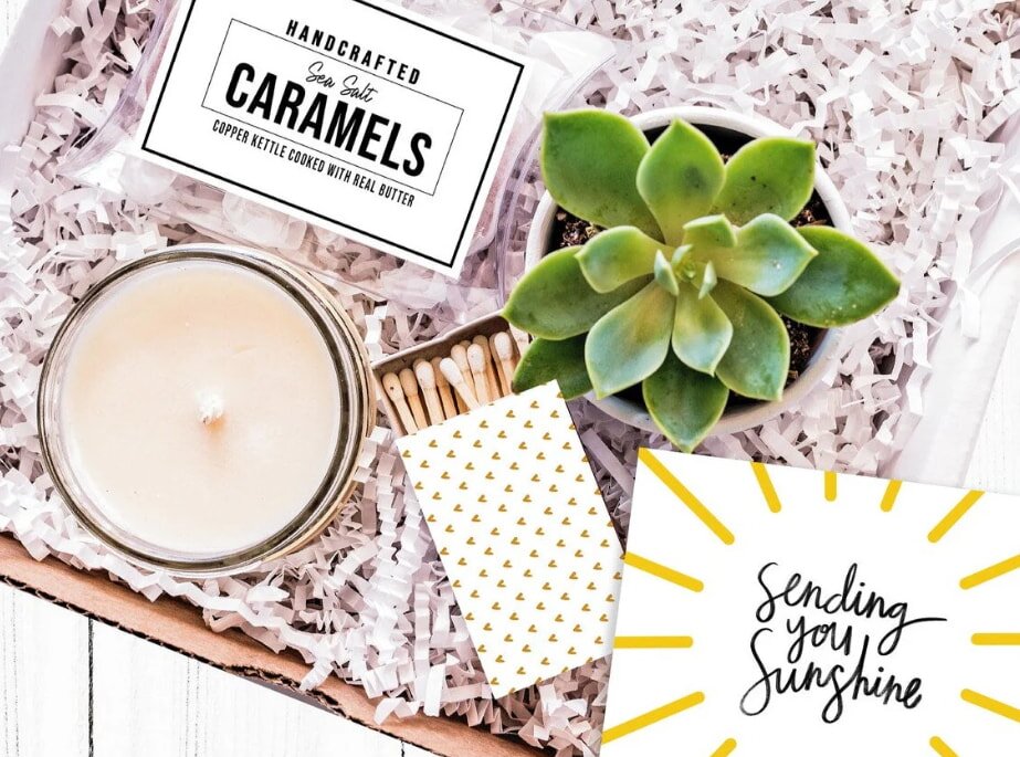 Gift box with succulent, candle, caramels and matches