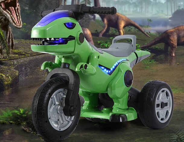 A green toy dinosaur bike featuring a dinosaur head on the front, designed for imaginative play.