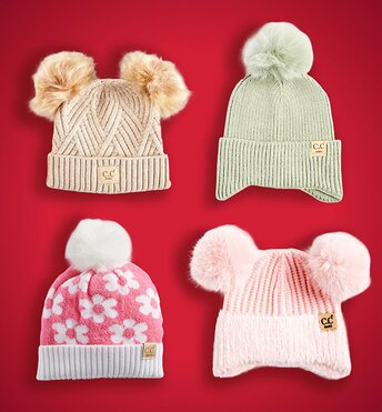 Four kids beanies displayed on a red background