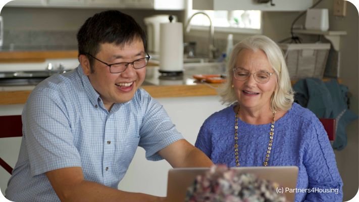 Man and woman participating in webinar