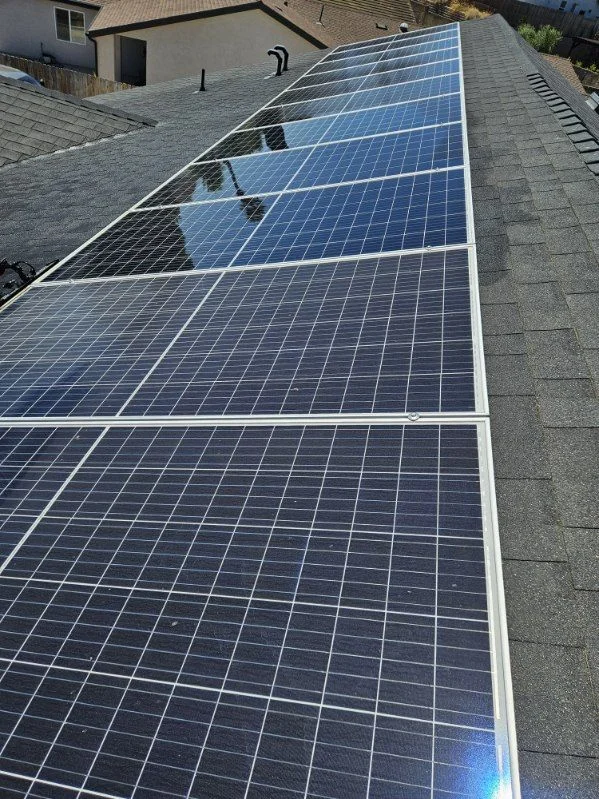 Clean rooftop solar panels after service