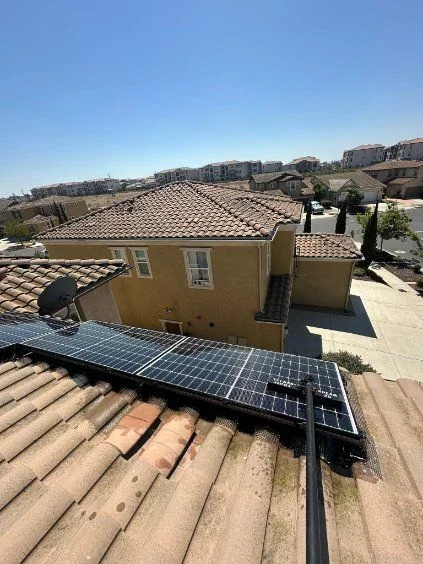 Solar panels installed on a tiled residential roof