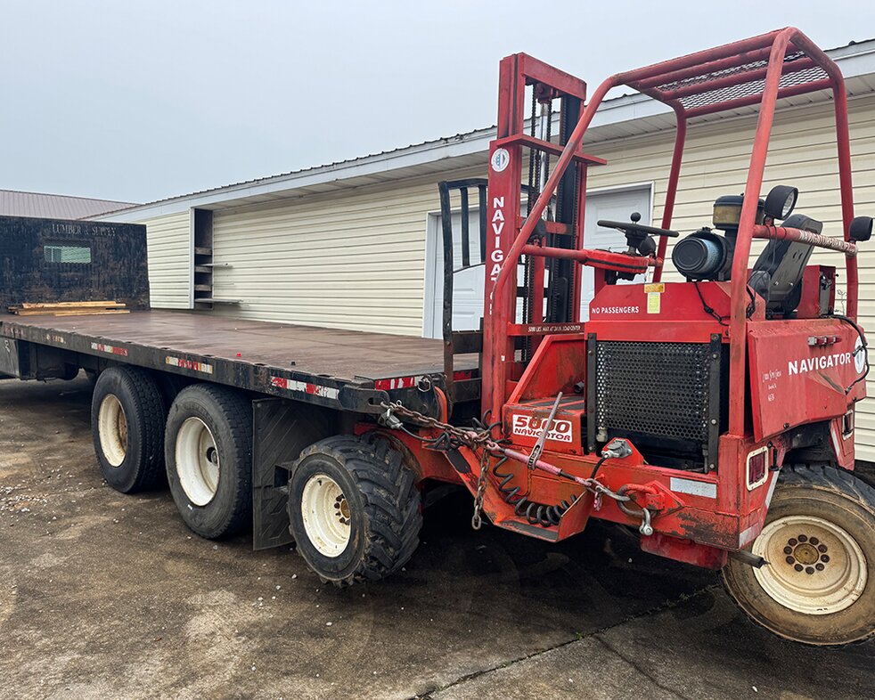 Delivery trucks at Booneville Lumber Company