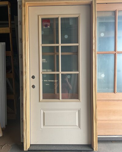 Doors and windows available at Booneville Lumber Company.