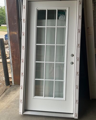 Doors and windows available at Booneville Lumber Company.