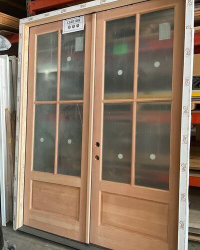 Doors and windows available at Booneville Lumber Company.