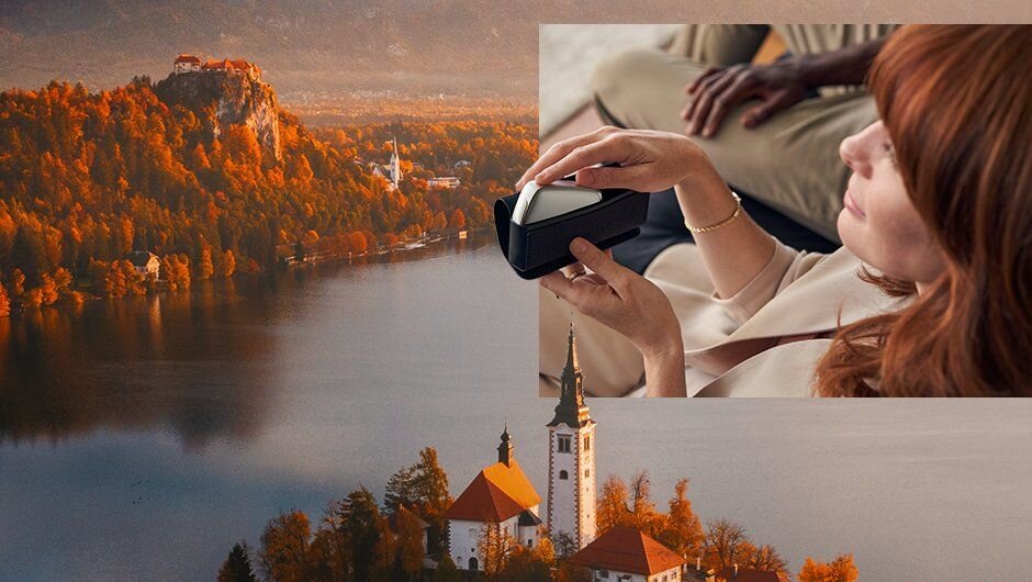 Podzimní fotka jezera v Slovinsku a stříbrné zařízení Ploom v pouzdře.