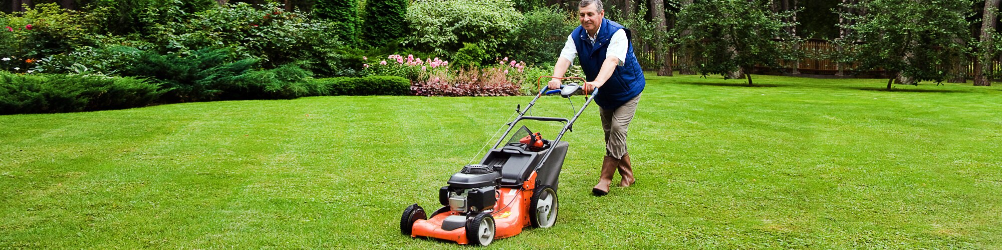 A person mowing lawn