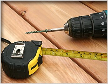 Tape measure and p
ower drill with nail