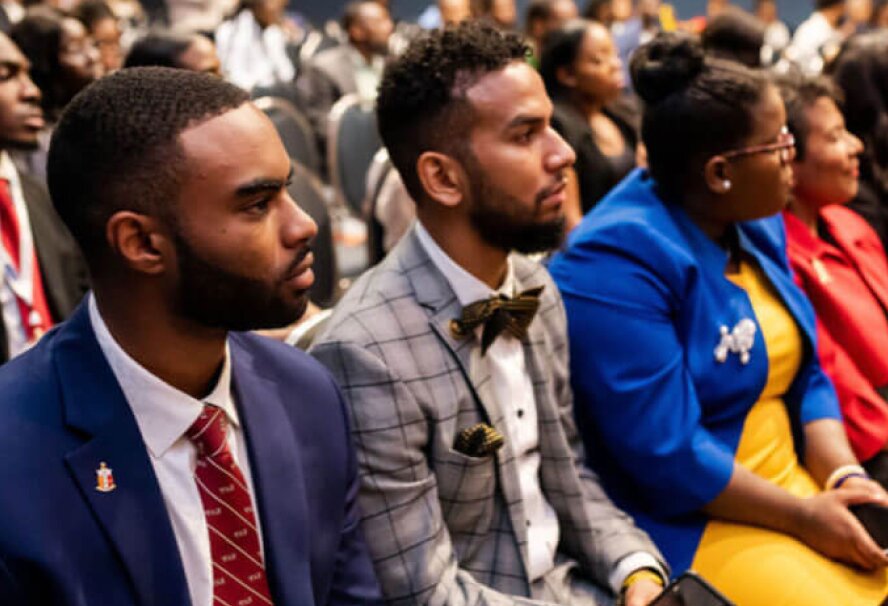 people seated at an event