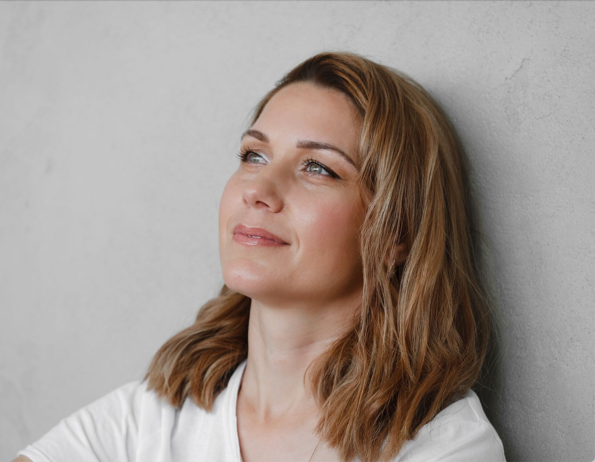 woman thinking smiling