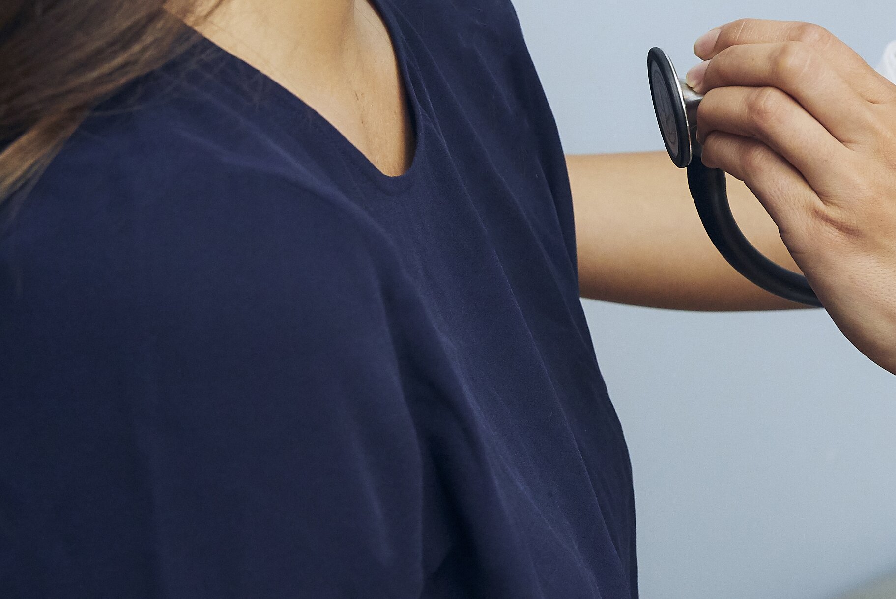 Green-tinted microscope image of cells