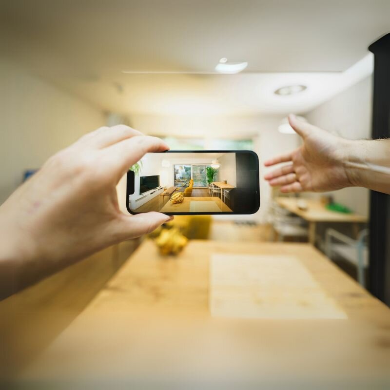 Person using the Scansurance app to visually compare a scan of their rental property after checkout to document condition for insurance or deposit disputes.