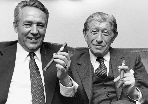 Dr. Schneider and Zino Davidoff enjoying a cigar together.