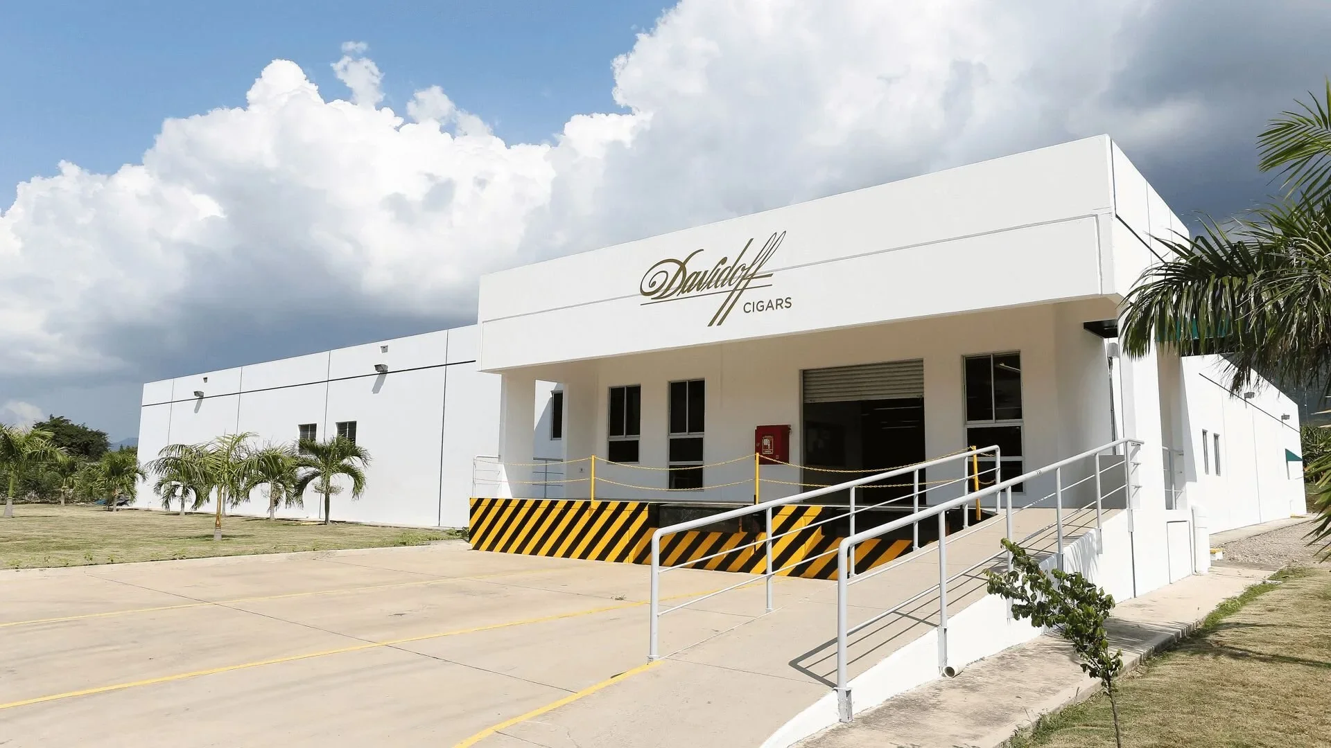 Front view of a building with a Davidoff Cigars logo on the building. 