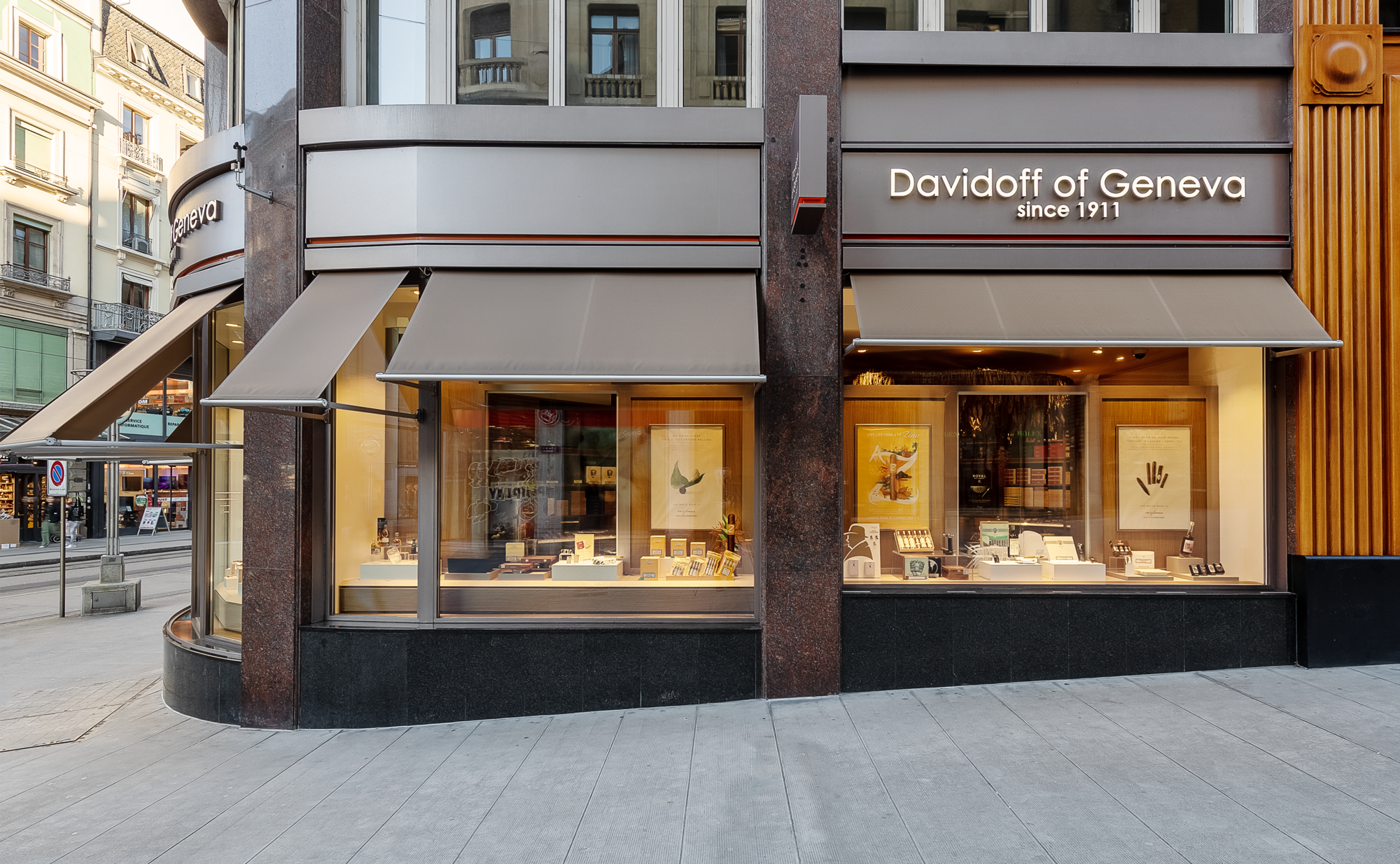 The image features a storefront of a shop called "Davidoff of Geneva" with a large window display. 