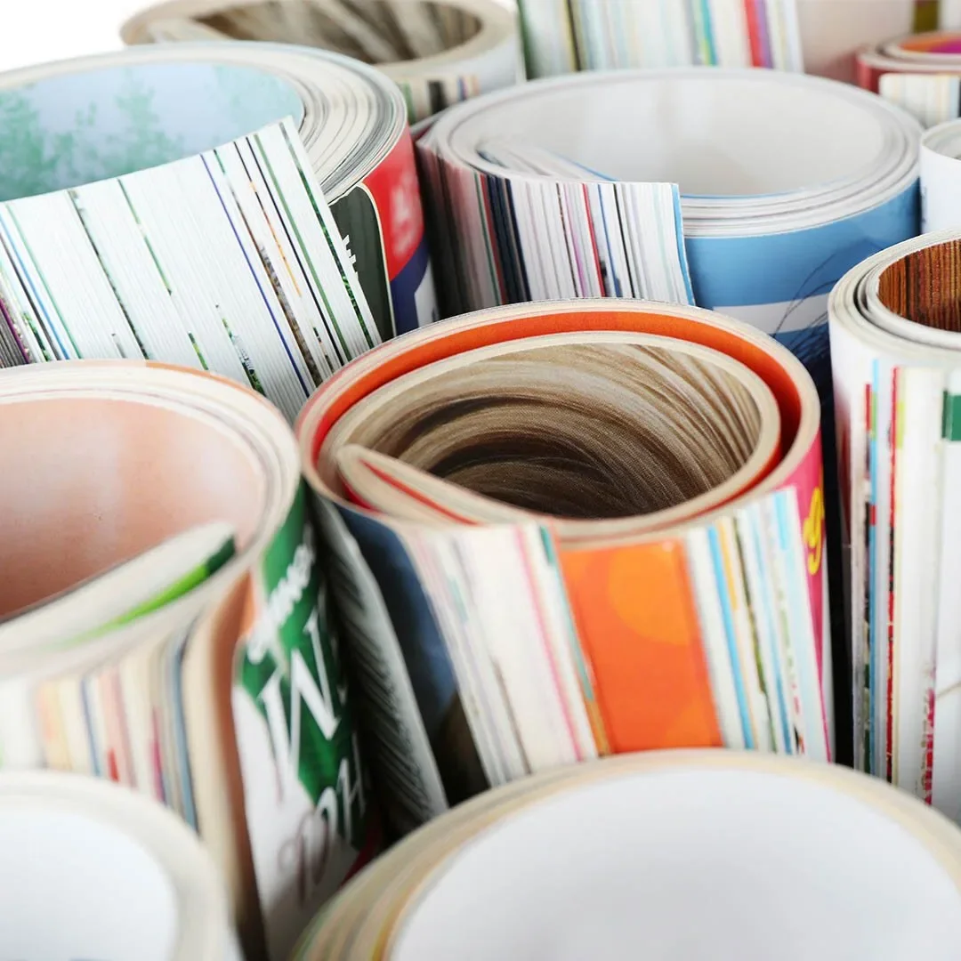 a close-up of rolled-up magazines