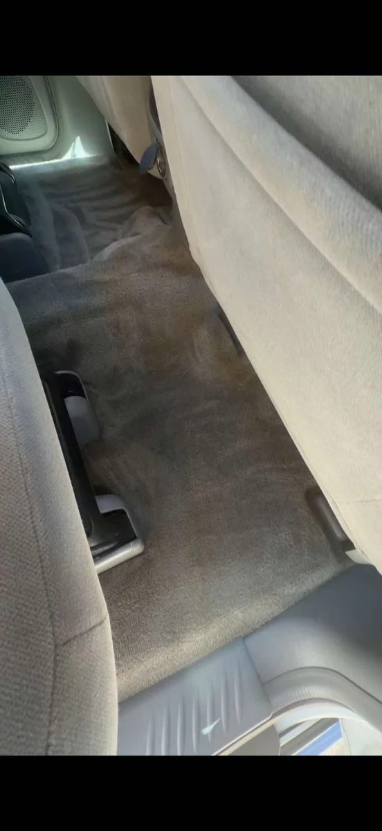 Vehicle rear floor carpet after interior detailing