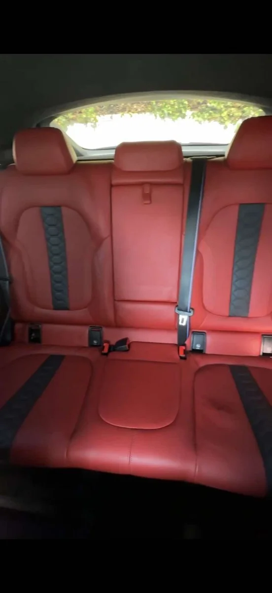 Clean red leather rear vehicle seats