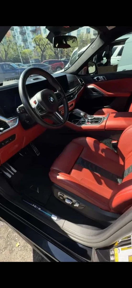 Detailed red and black BMW vehicle interior