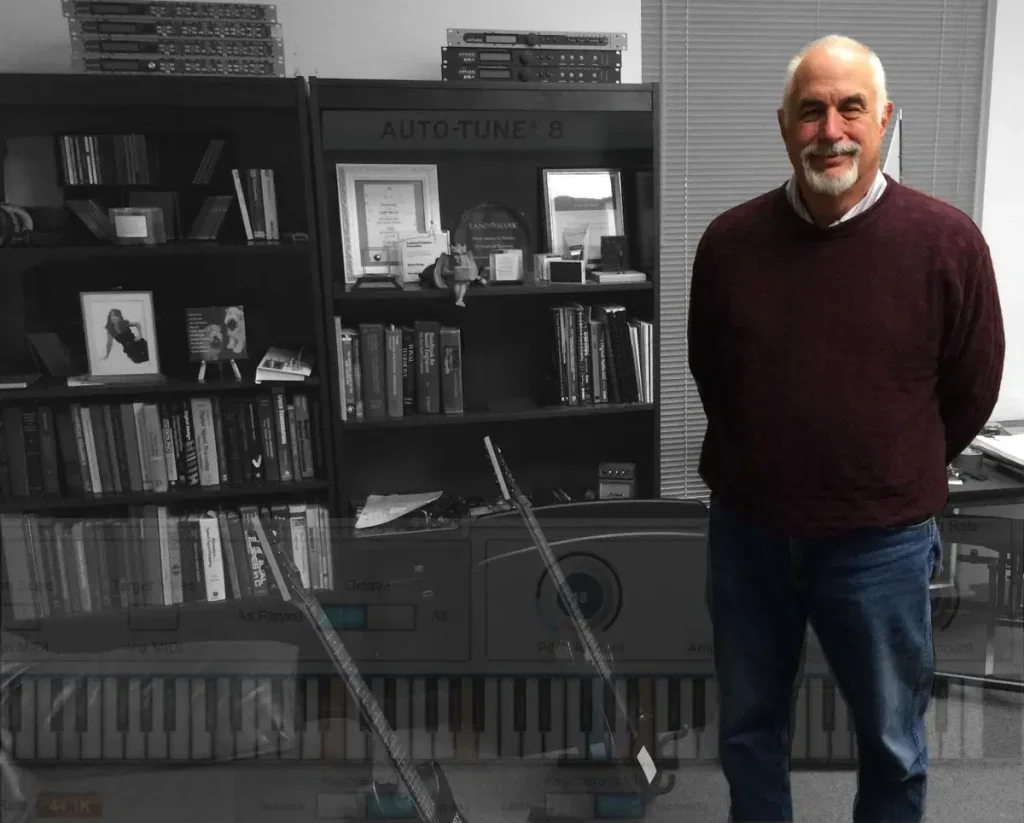 A photo of Dr. Andy Hildebrand standing in his office