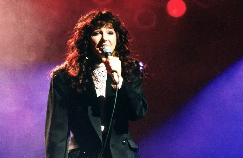 Kate Bush singing into a microphone