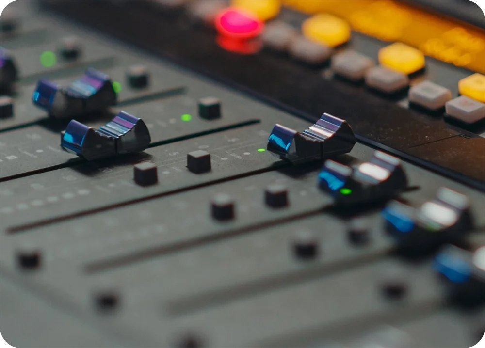 A detail shot of a mixer control console